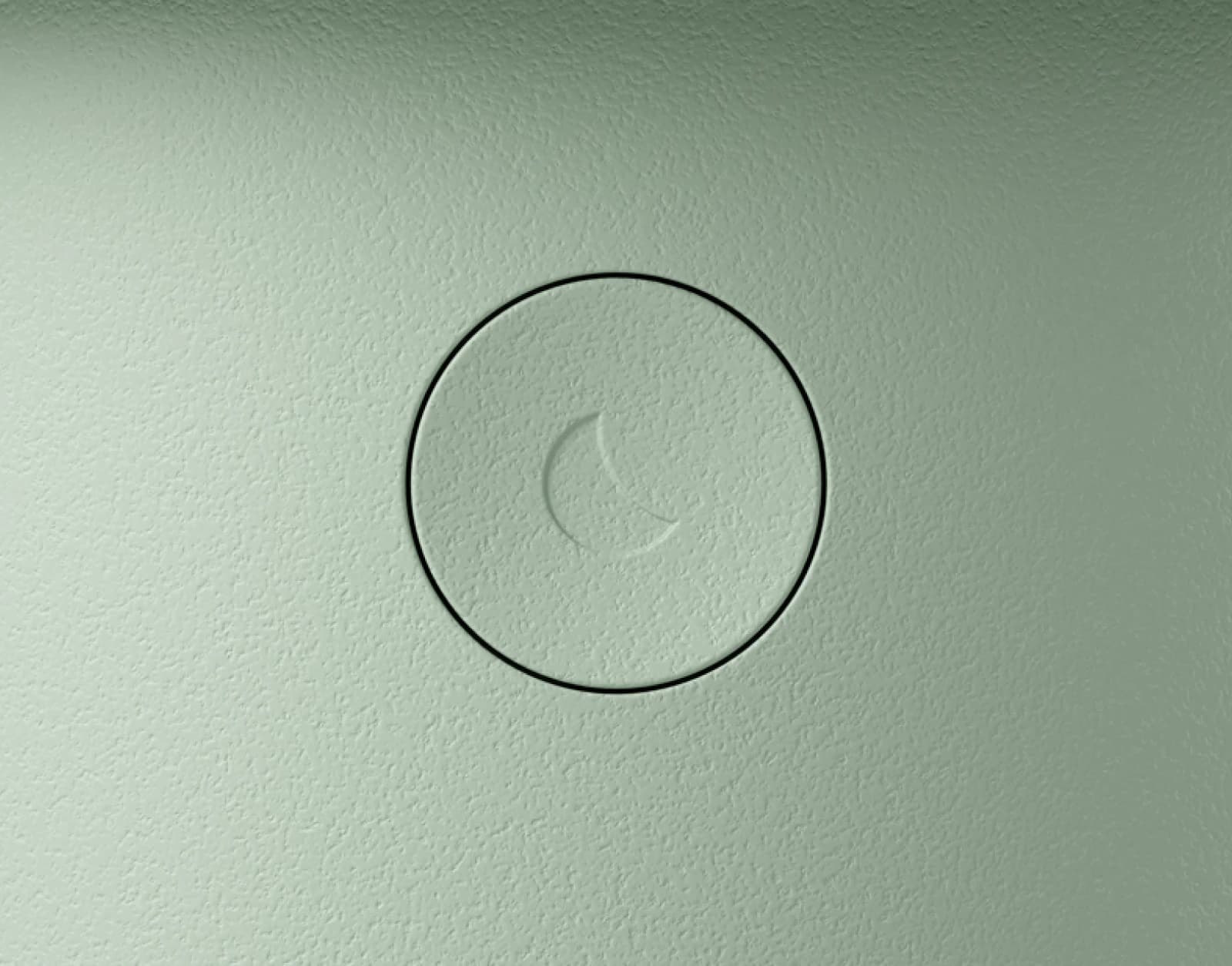 Closeup of sleep button on Hatch Baby Mint