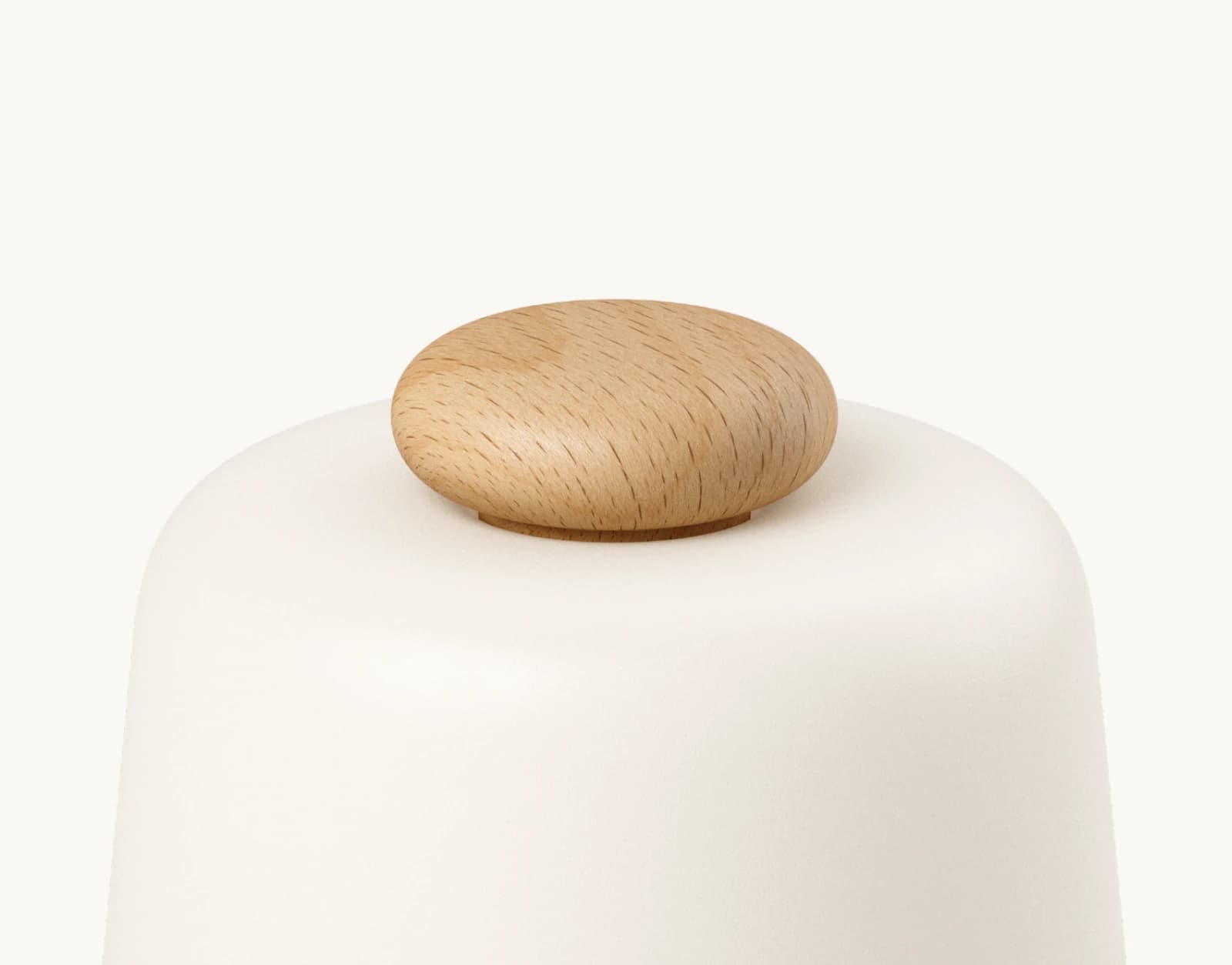 Closeup of top button on a Hatch Baby Beechwood